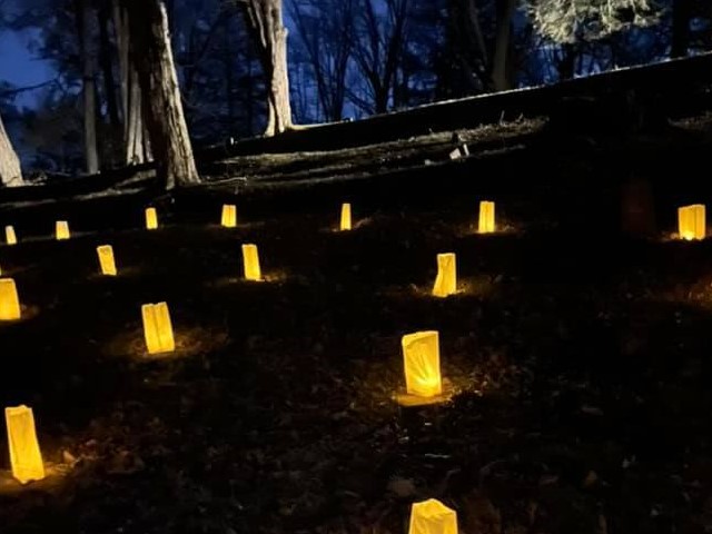 Luminary Event. 114 candles placed in bags in memory of coal miners